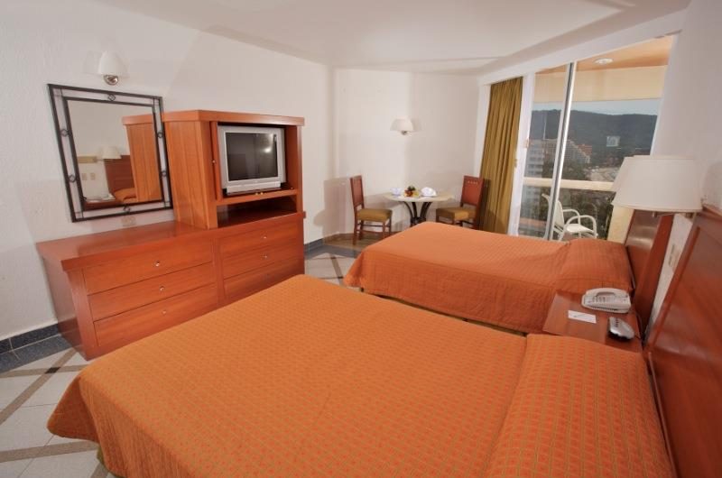 Hotel Park Royal Ixtapa Cuartos. Habitación Estándar con vista al jardín. Nuestras cómodas habitaciones con decoración estilo contemporáneo mexicano son el sitio ideal para que descanses en Ixtapa Zihuatanejo. Camas: 2 matrimoniales o 1 king size