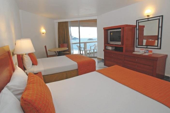 Habitación Estándar Superior vista al mar en el Hotel Park Royal Ixtapa, cuenta con 2 camas matrimoniales o 1 king size, ideal para 4 personas. Reserva tus vacaciones en Ixtapa Zihuatanejo Todo Incluido