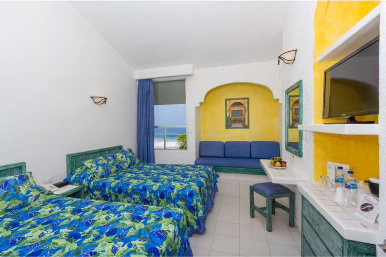 Hotel Posada Real Ixtapa Cuartos con vista al mar en Playa El Palmar Ixtapa, con 2 camas matrimoniales, ideales para 4 personas