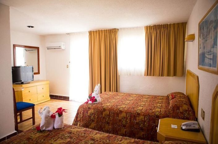 Hotel Qualton Club Ixtapa cuenta con 154 cómodas habitaciones con dos camas matrimoniales o una cama king size, capacidad para un máximo de 4 personas (Dos adultos, dos niños)